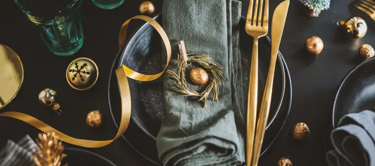 Served Christmas Table Setting Dark Tones With Golden Deco