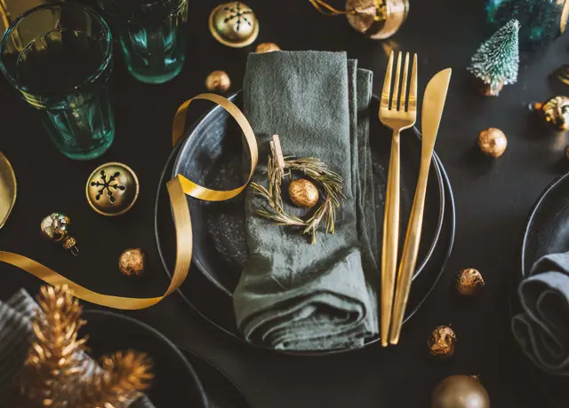 Served Christmas Table Setting Dark Tones With Golden Deco