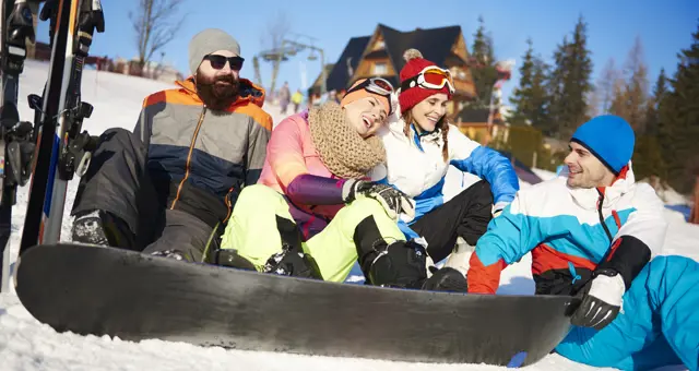 Four Friends With Snowboarders Snow